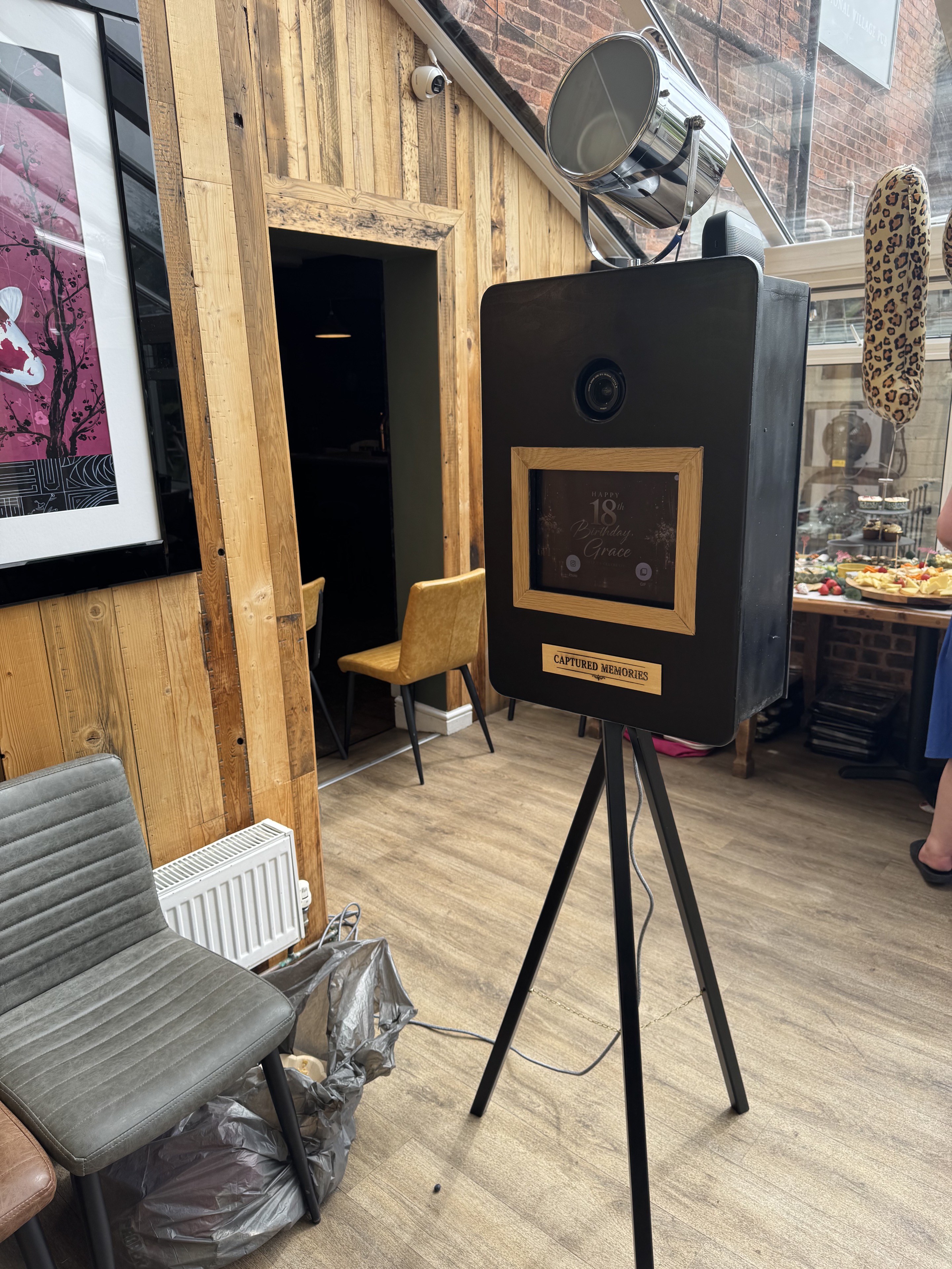Captured Memories photo booth set up inside a celebration venue
